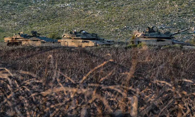 Israeli tanks in formation near the Israel-Lebanon border in northern Israel. &ndash; Reuters