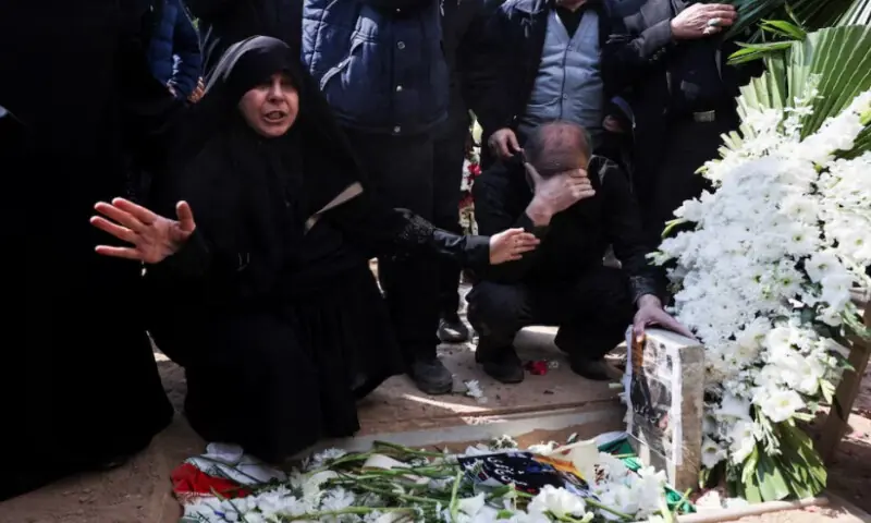 Mourners react as they attend a funeral ceremony for victims of Israeli and U.S. strikes, in Tehran, on March 9, 2026. Reuters
