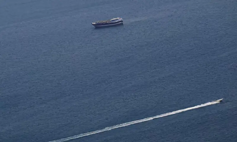 Boats in the Strait of Hormuz amid the US-Israeli conflict with Iran, as seen from Musandam, Oman. &ndash; Reuters