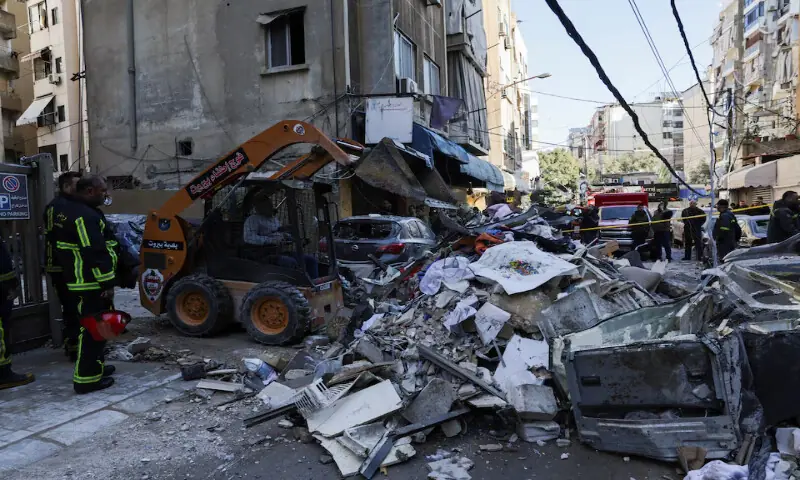 A man uses machinery to clear debris near the site of an Israeli strike on an apartment building, in central Beirut, Lebanon. &ndash; Reuters