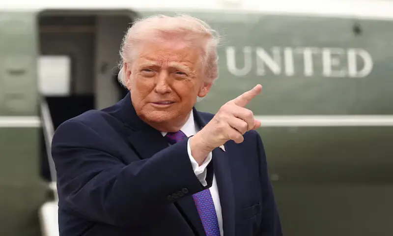 US President Donald Trump gestures at Joint Base Andrews in Maryland, US. &ndash; Reuters