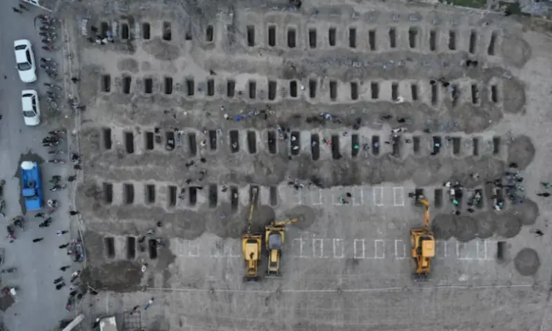 Graves were prepared for the victims in Minab on March 2. Reuters