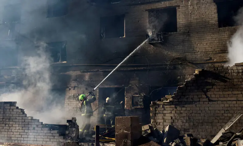 Firefighters work at the site of a Russian missile and drone strike in the town of Brovary, Kyiv region, Ukraine. &ndash; Reuters