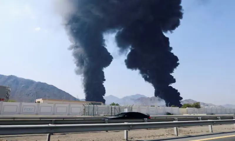 Smoke rises in the Fujairah oil industry zone, caused by debris after interception of a drone by air defenses, according to the Fujairah media office, amid the US-Israel conflict with Iran, in Fujairah, United Arab Emirates. &ndash; Reuters
