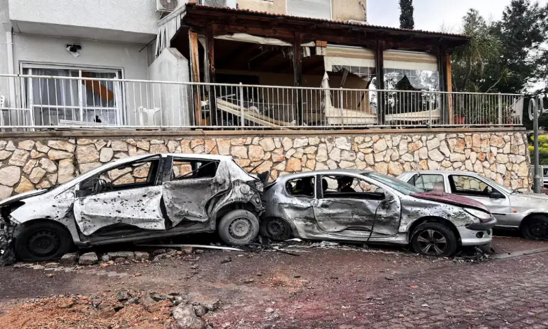 Damaged vehicles and buildings, after a projectile was launched towards Israel from the Iran-backed Hezbollah in Lebanon, following an escalation between Hezbollah and Israel amid the US-Israeli conflict with Iran, in northern Israel. – Reuters Damaged vehicles and buildings, after a projectile was launched towards Israel from the Iran-backed Hezbollah in Lebanon, following an escalation between Hezbollah and Israel amid the US-Israeli conflict with Iran, in northern Israel. – Reuters