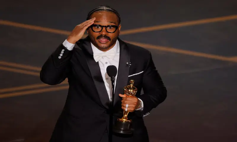 Ryan Coogler accepts the Oscar for Best Original Screenplay for &ldquo;Sinners&rdquo;. &ndash; Reuters