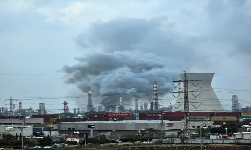 Smoke rises from an oil refinery that was damaged in an Iranian attack, amid the U.S.-Israel conflict with Iran, in Haifa, Israel, on March 19, 2026. Reuters