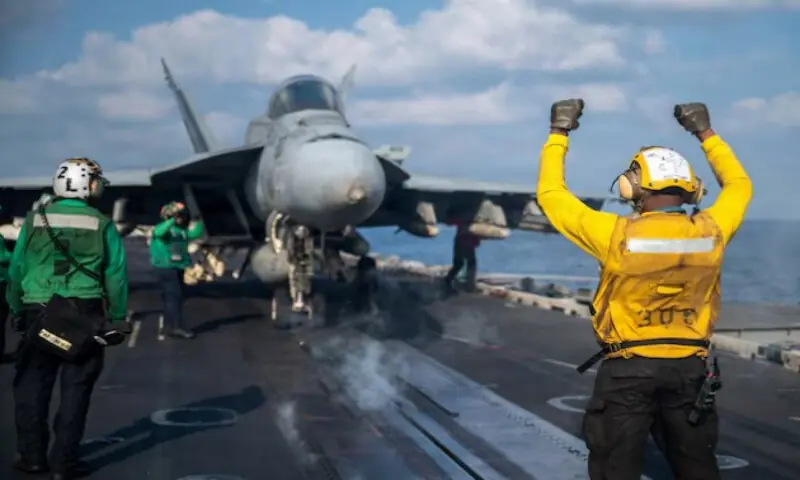 A U.S. Navy sailor signals an F/A-18E Super Hornet on the flight deck of the Nimitz-class aircraft carrier USS Abraham Lincoln in support of the Operation Epic Fury attack on Iran at an undisclosed location on March 4, 2026. Reuters A U.S. Navy sailor signals an F/A-18E Super Hornet on the flight deck of the Nimitz-class aircraft carrier USS Abraham Lincoln in support of the Operation Epic Fury attack on Iran at an undisclosed location on March 4, 2026. Reuters