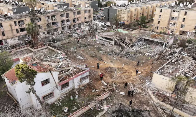 A drone view shows a damage in a residential neighbourhood, following a night of Iranian missile strikes which injured dozens of Israelis, amid the U.S.-Israel conflict with Iran, in Dimona, southern Israel, on March 22, 2026. Reuters