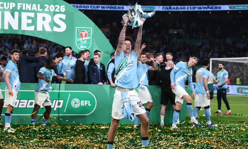 Manchester City&rsquo;s Nico O&rsquo;Reilly celebrates with the trophy after winning the Carabao Cup. &ndash; REUTERS