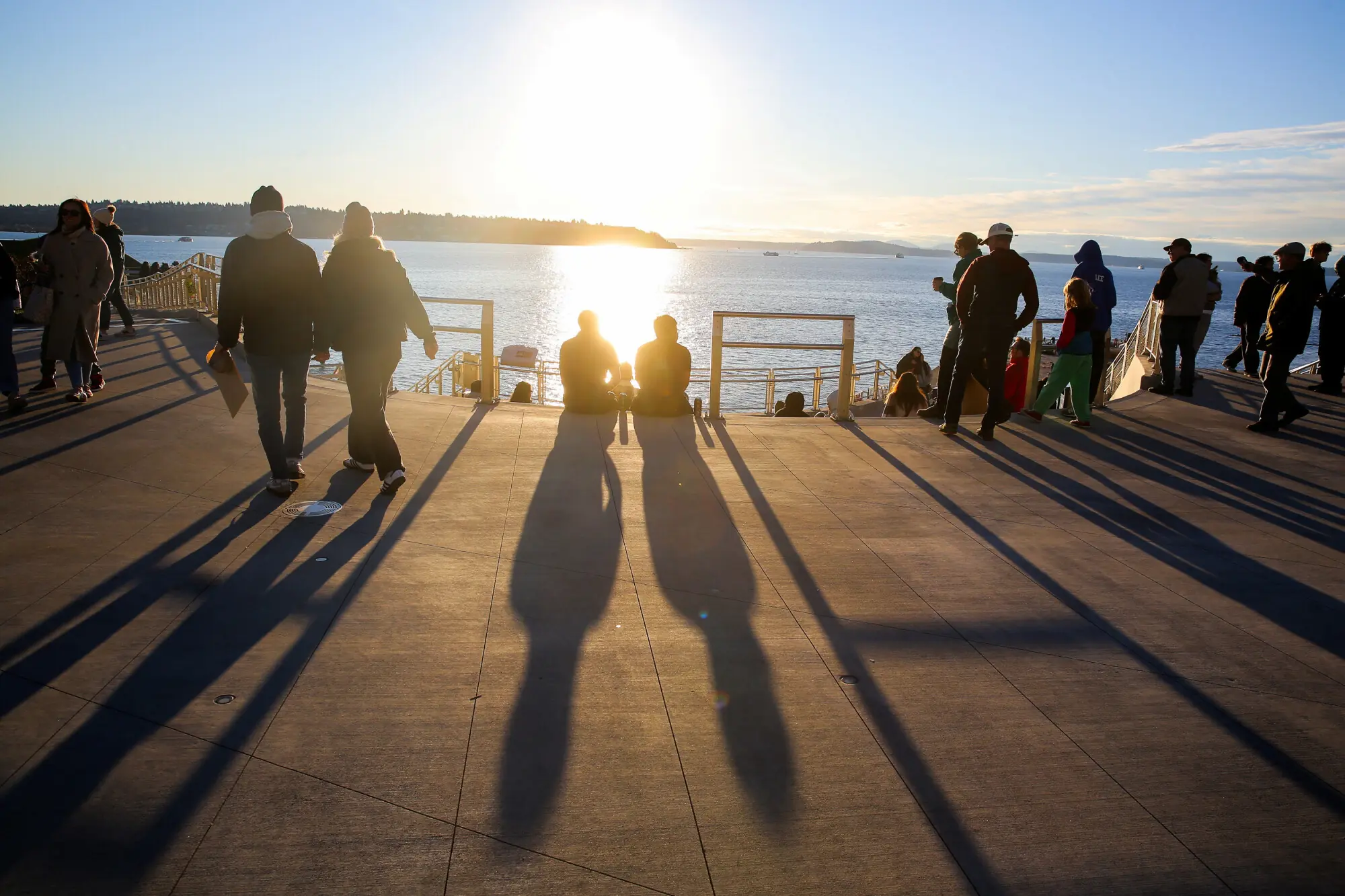 People in the late afternoon sun in Seattle, Washington, U.S. – Reuters People in the late afternoon sun in Seattle, Washington, U.S. – Reuters