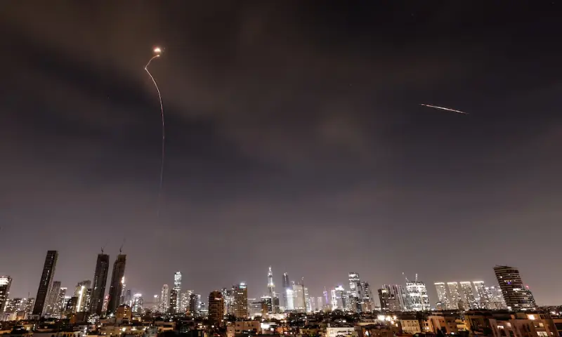 Streaks of light illuminate the sky during an interception attempt amid the U.S.-Israeli conflict with Iran, as seen from Tel Aviv, Israel. – Reuters Streaks of light illuminate the sky during an interception attempt amid the U.S.-Israeli conflict with Iran, as seen from Tel Aviv, Israel. – Reuters