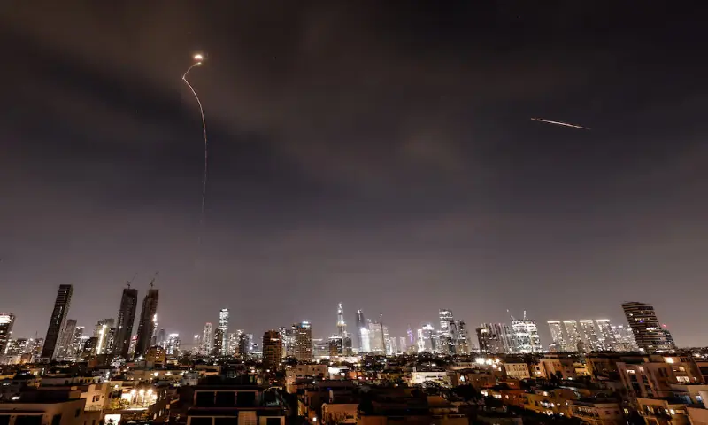 Streaks of light illuminate the sky during an interception attempt as seen from Tel Aviv, Israel. – Reuters Streaks of light illuminate the sky during an interception attempt as seen from Tel Aviv, Israel. – Reuters