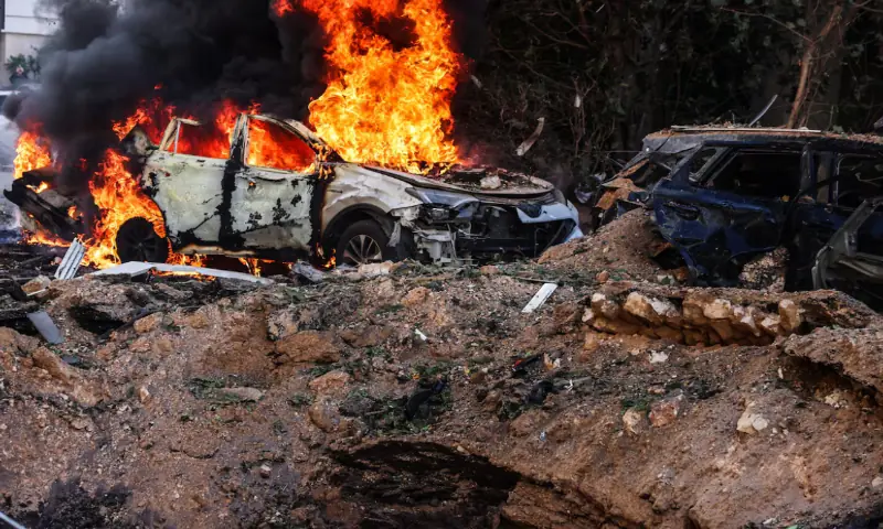 Fire engulfs a car at a site following Iranian missile barrages in central Israel, amid the US-Israel conflict with Iran, in Tel Aviv, Israel. &ndash; Reuters