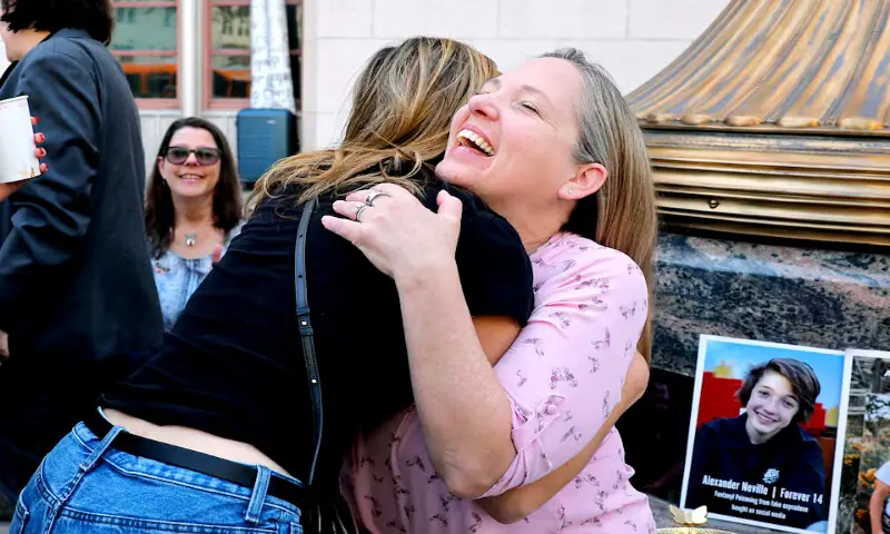 Amy Neville, mother of Alexander, is embraced outside the court as she awaits the jury&rsquo;s verdict in a key test case accusing Meta and Google&rsquo;s YouTube of harming children&rsquo;s mental health through addictive social media platforms, in Los Angeles, California, on Wednesday. &ndash; Reuters