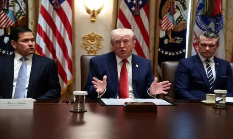 U.S. President Donald Trump, sitting next to Secretary of State Marco Rubio and Defence Secretary Pete Hegseth, speaks during a cabinet meeting at the White House in Washington, D.C., U.S., on March 26, 2026. Reuters