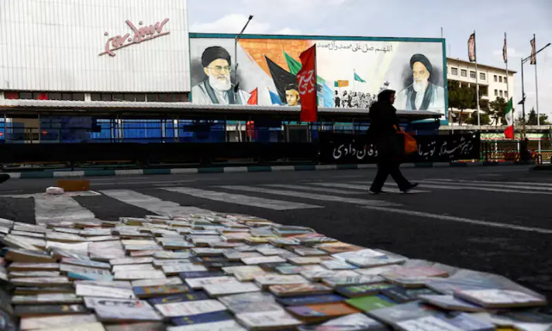A woman walks next to a mural depicting the late leaders Ayatollah Ruhollah Khomeini and Ayatollah Ali Khamenei in Tehran. – Reuters A woman walks next to a mural depicting the late leaders Ayatollah Ruhollah Khomeini and Ayatollah Ali Khamenei in Tehran. – Reuters