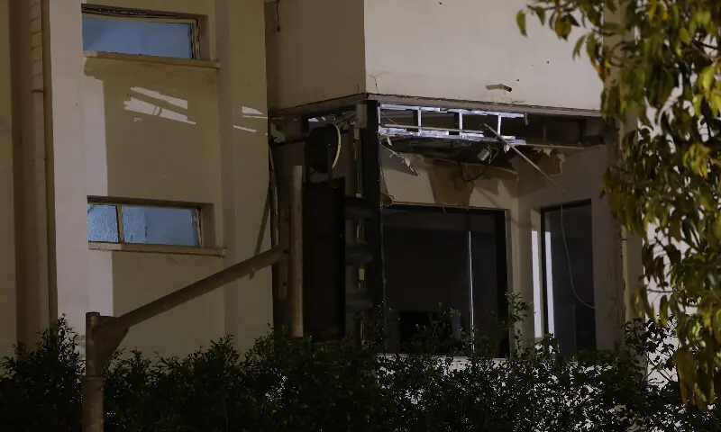 Damage on a building at the impact site following Iranian missile barrages in Tel Aviv, Israel, on Saturday. &ndash; Reuters