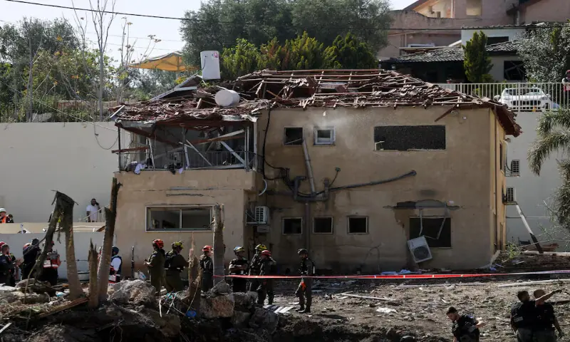 Israeli rescue personnel work at the impact site following Iranian missile barrages as the U.S.-Israeli conflict with Iran continues, in central Israel, on March 28, 2026. Reuters