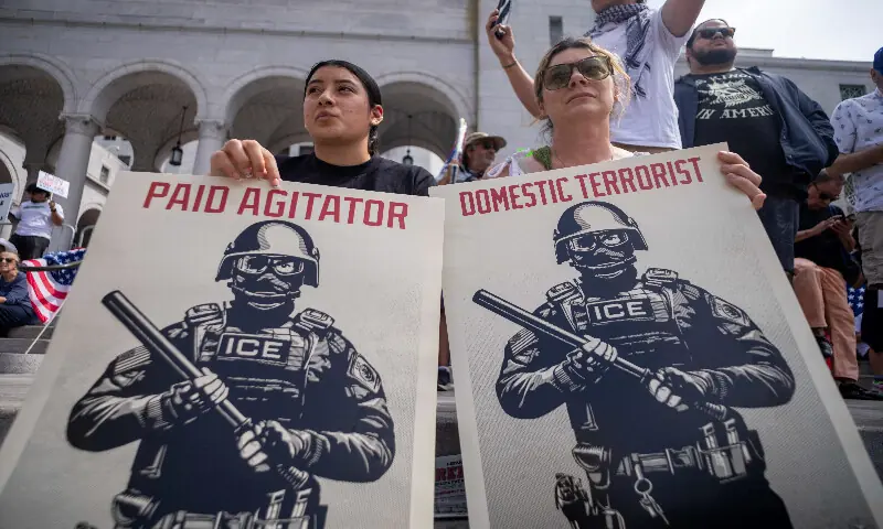 Demonstrators hold signs during a &ldquo;No Kings&rdquo; protest against US President Donald Trump&rsquo;s policies, in Los Angeles, California. &ndash; Reuters