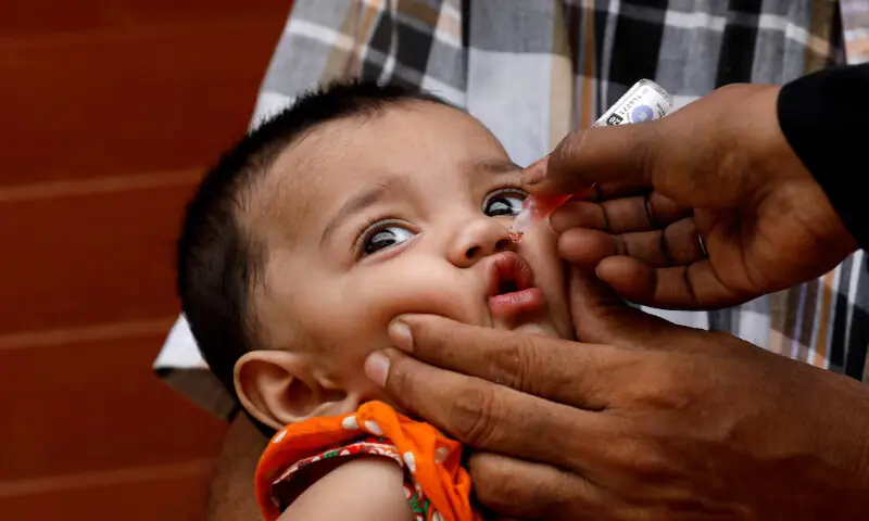 A girl receives polio vaccine drops during an anti-polio campaign in Karachi. – Reuters file A girl receives polio vaccine drops during an anti-polio campaign in Karachi. – Reuters file