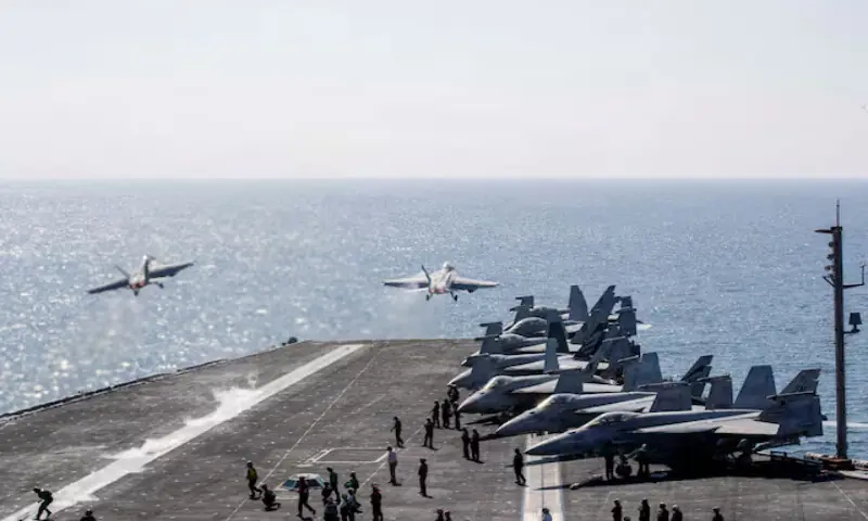 Two F/A-18 Super Hornets launch from the flight deck of the U.S. Navy Nimitz-class aircraft carrier USS Abraham Lincoln in support of the Operation Epic Fury attack on Iran from an undisclosed location on March 3, 2026. Reuters file