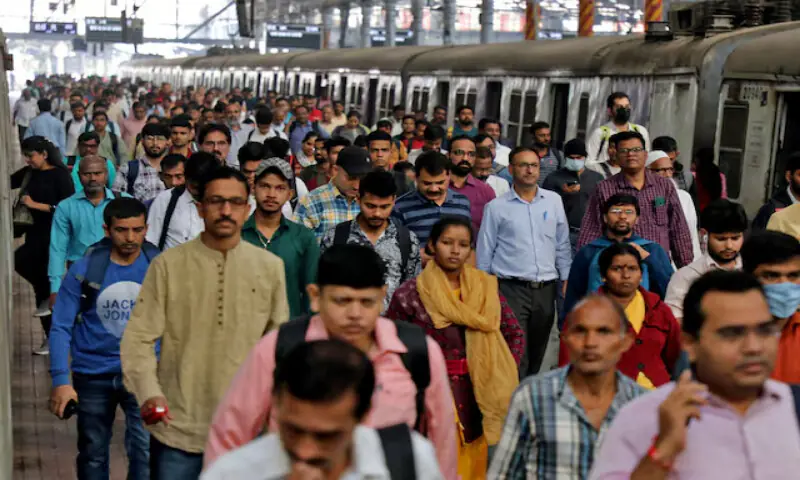 Commuters walk on a platform after disembarking from a suburban train at a railway station in Mumbai, India. – Reuters Commuters walk on a platform after disembarking from a suburban train at a railway station in Mumbai, India. – Reuters