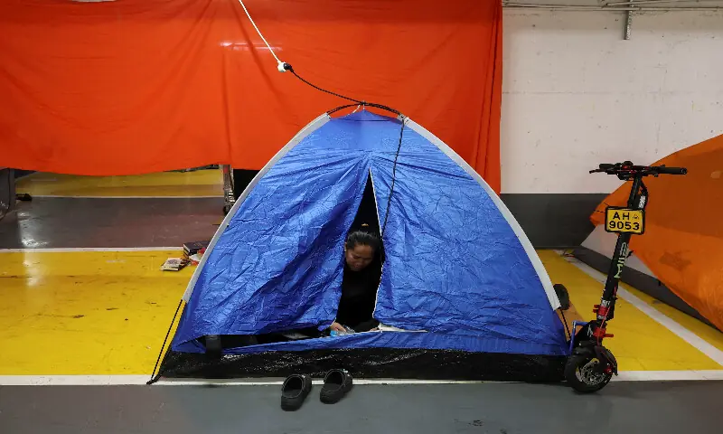 A person rests in a tent set in an underground parking garage used as a public bomb shelter as Israelis hold a Passover Seder in Tel Aviv. &ndash; Reuters
