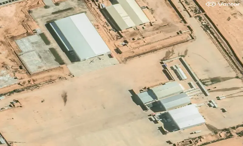 Two smaller drones were visible outside a hangar (top left) at Al Khadim airbase on December 17, 2025. Experts said they were likely Turkish-made Bayraktar TB2 drones. &ndash; Reuters