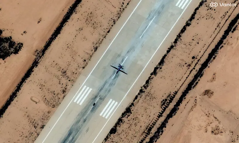 A combat drone is visible on the runway at Al Khadim airbase in this May 3, 2025, satellite image. Three weapons experts said it was most likely a Chinese-made Feilong-1. &ndash; Reuters