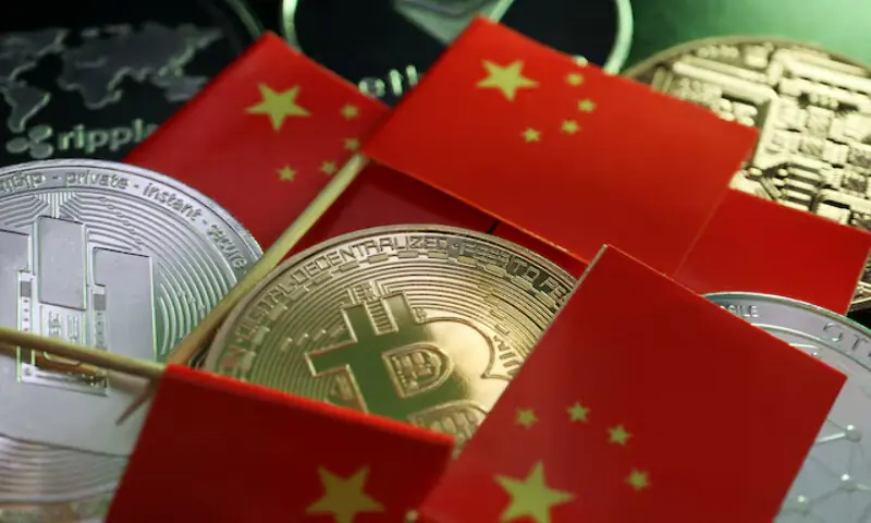 Chinese flags are seen among representations of Bitcoin, Dash, Ripple, Ethereum and other cryptocurrencies in this illustration picture taken June 2, 2021. Reuters file Chinese flags are seen among representations of Bitcoin, Dash, Ripple, Ethereum and other cryptocurrencies in this illustration picture taken June 2, 2021. Reuters file
