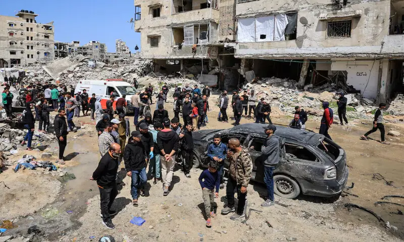 Palestinians inspect the damage after a person was hit by an Israeli strike while riding a bicycle, according to medics, in Gaza City, on April 6, 2026. Reuters Palestinians inspect the damage after a person was hit by an Israeli strike while riding a bicycle, according to medics, in Gaza City, on April 6, 2026. Reuters