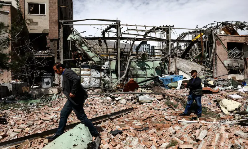 People inspect the damage at the research building of the Shahid Beheshti University, which was damaged by a strike, amid the U.S.-Israeli conflict with Iran, in Tehran, on April 4, 2026. Reuters file People inspect the damage at the research building of the Shahid Beheshti University, which was damaged by a strike, amid the U.S.-Israeli conflict with Iran, in Tehran, on April 4, 2026. Reuters file