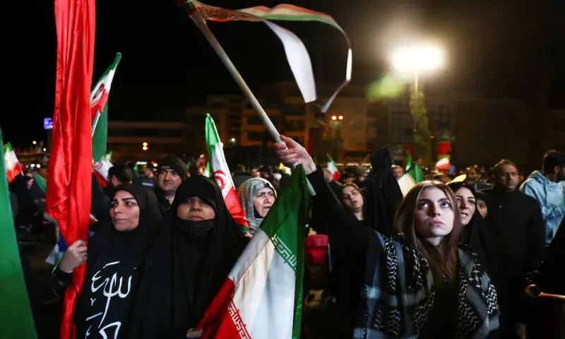 People gather after a two-week ceasefire in the Iran war was announced, in Tehran, Iran, on Wednesday. &ndash; Reuters