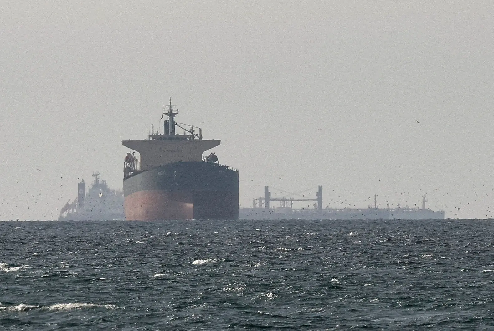 Cargo ships in the Gulf, near the Strait of Hormuz, as seen from northern Ras al-Khaimah. Reuters file