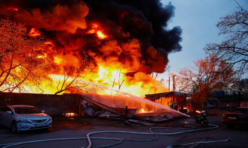Firefighters work at the site of a Russian missile strike in Kyiv, Ukraine, on Thursday. &ndash; Reuters