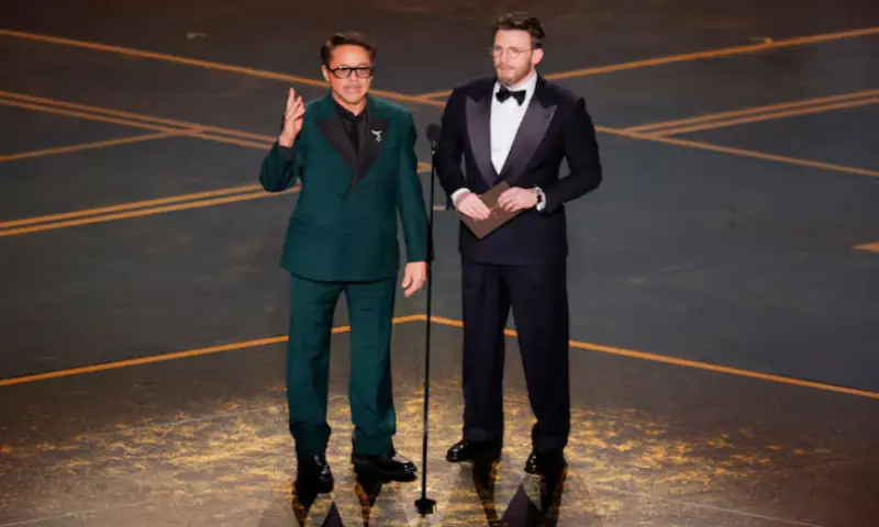 Robert Downey Jr. and Chris Evans present on stage during the Oscars show at the 98th Academy Awards in Hollywood, Los Angeles, California, US. &ndash; Reuters