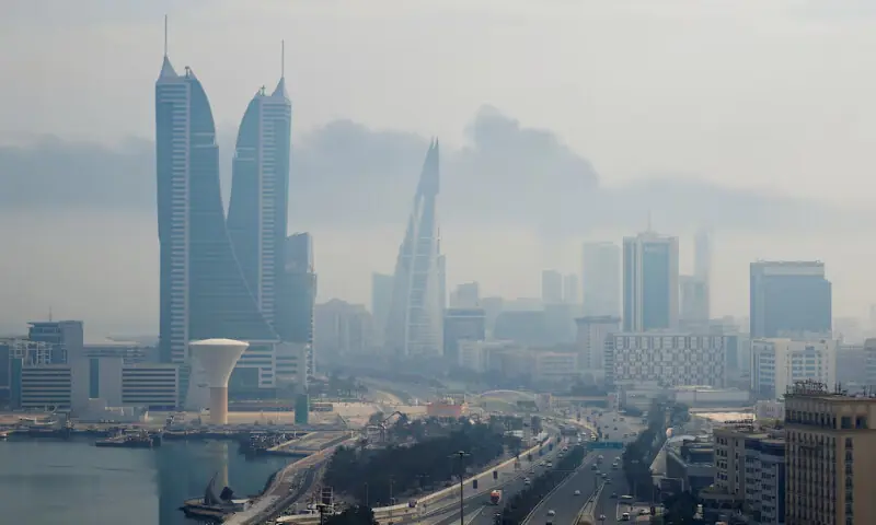 Smoke rises following a reported Iranian drone strike on the fuel storage facility of Bahrain International Airport, amid the US-Israeli conflict with Iran, in Muharraq, Manama, Bahrain, on March 12, 2026. Reuters file