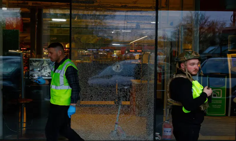 A bullet hole in the glass of a supermarket, where Ukrainian police killed a man who opened fire in a city district and barricaded himself into the supermarket in Kyiv, Ukraine. &ndash; Reuters