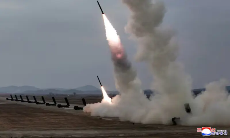 A test-launch of 600mm-calibre multiple rocket launchers is overseen by North Korean leader Kim Jong Un (not pictured) in North Korea. &ndash; Reuters