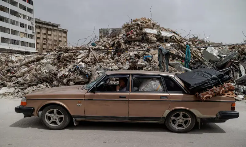 Residents drive home following a 10-day ceasefire between Lebanon and Israel went into effect in Nabatieh, Lebanon. &ndash; Reuters