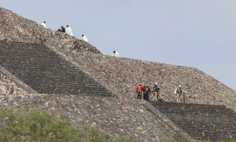 Mexican authorities work at the crime scene at the Teotihuacan pyramids on the outskirts of Mexico City. &ndash; Reuters