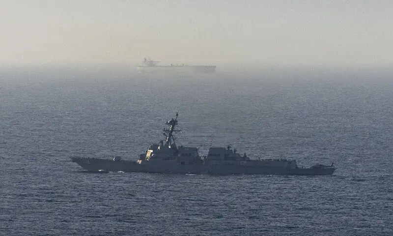 This US Navy handout photograph released on April 21, 2026, by US Central Command Public Affairs shows Arleigh Burke-class guided-missile destroyer USS Michael Murphy patrolling the Arabian Sea during a maritime blockade on April 15, 2026. AFP