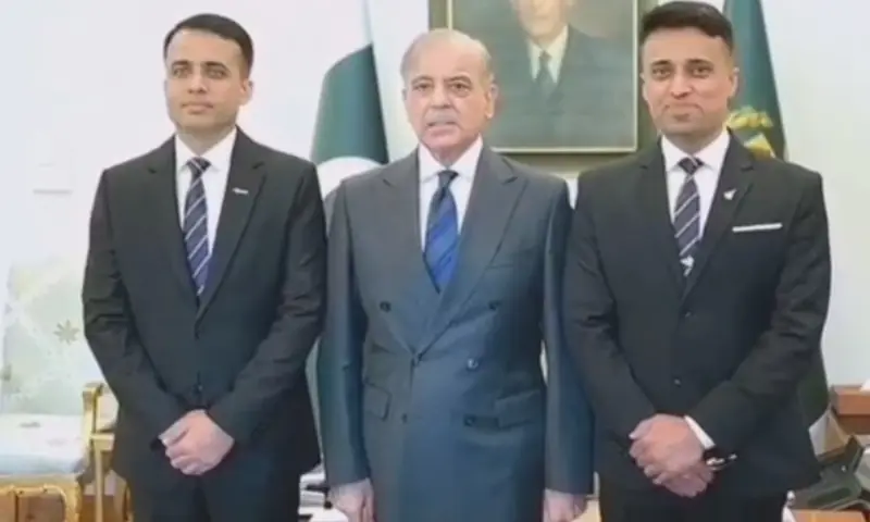 Khurram Dawood and Muhammad Zeeshan Ali with Prime Minister Shehbaz Sharif.