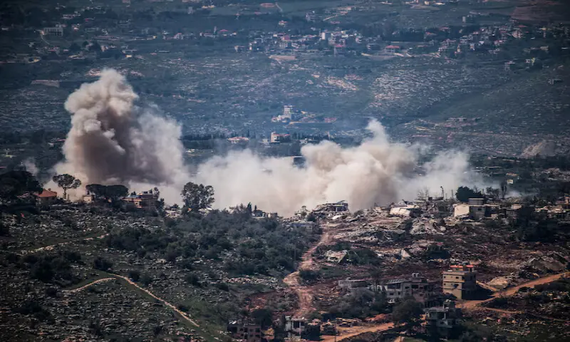 Smoke rises from a village in southern Lebanon after an Israeli army strike. -- Reuters