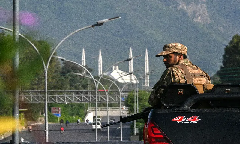 An army personnel keeps watch in the Red Zone area of Islamabad on April 25, 2026. AFP