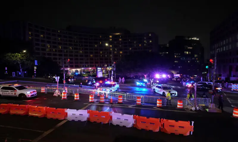 Police gather at the scene as a shooter opens fire during the annual White House Correspondents' Association dinner in Washington, DC. -- Reuters