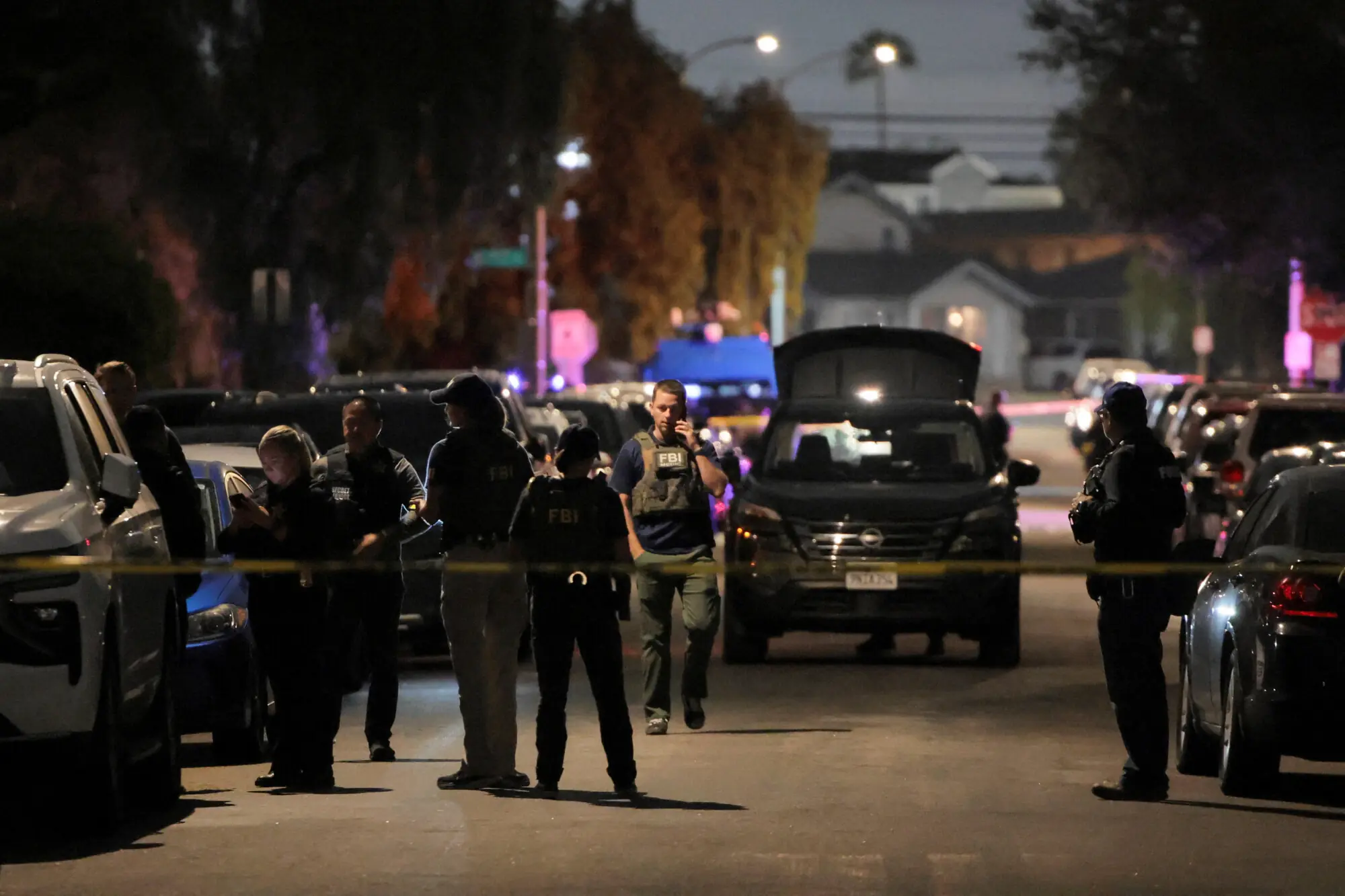 FBI agents and police officers work outside the residence associated with Cole Tomas Allen, the suspect in the shooting incident at the annual White House Correspondents' Association dinner in Washington, DC, in Torrance, California. -- Reuters