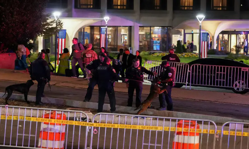 Police K-9 Unit officers stand with other law enforcement personnel at the venue in Washington, DC. -- Reuters