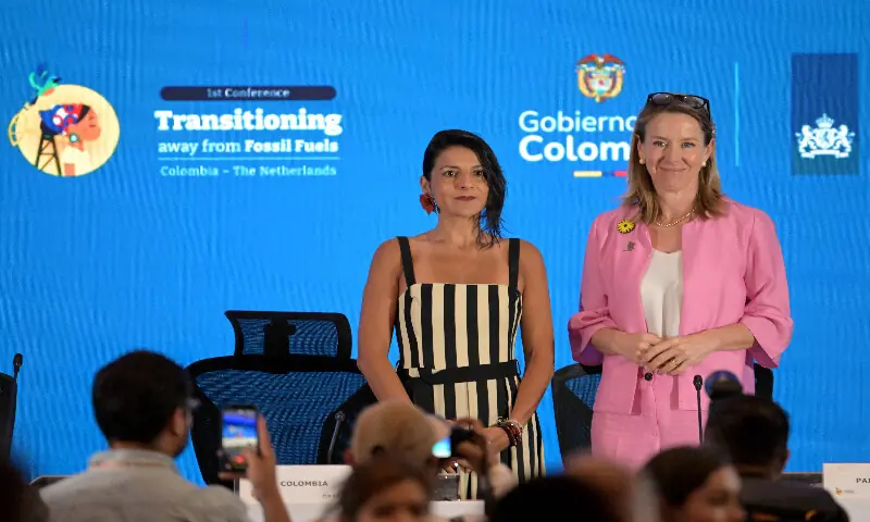 Dutch Minister of Climate and Green Growth Stientje van Veldhoven (right) and Colombia's Environment Minister Irene Velez pose for pictures during the International Conference on the Just Transition Away from Fossil Fuels in Santa Marta, Colombia, on April 28, 2026. AFP